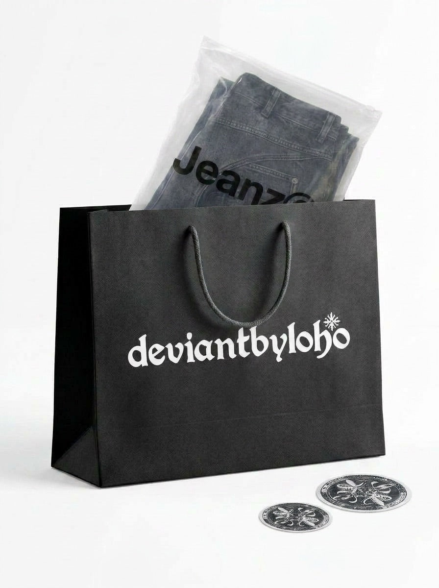 deviantbyloho packaging — the official Jeanz&copy; zip-lock bag with folded denim and stickers, beside the black deviantbyloho gift bag